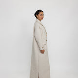 Abaya coat with classic trench design, featuring wide lapels and clean tailoring
