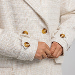 Trench-inspired outerwear abaya with an open front and relaxed, oversized feel.