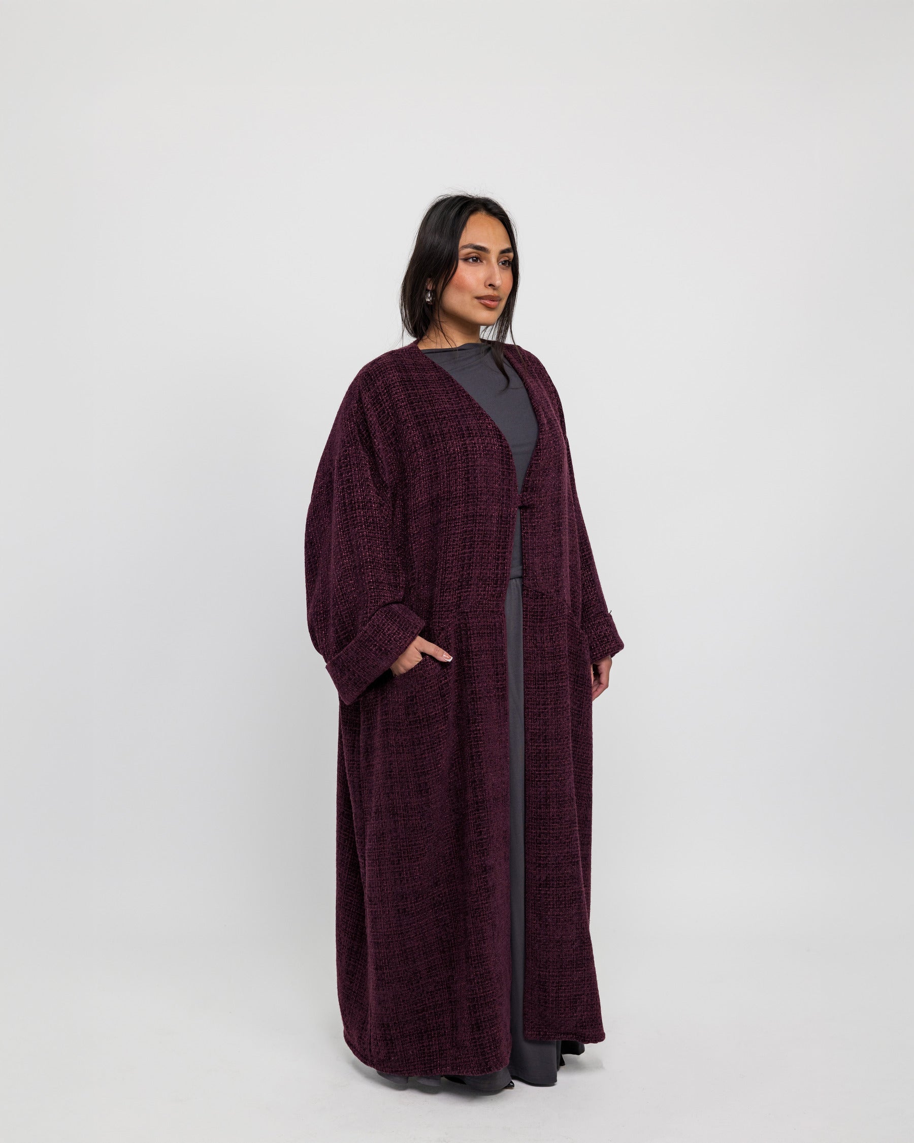 Tweed-textured abaya offering effortless layering with a touch of everyday luxury