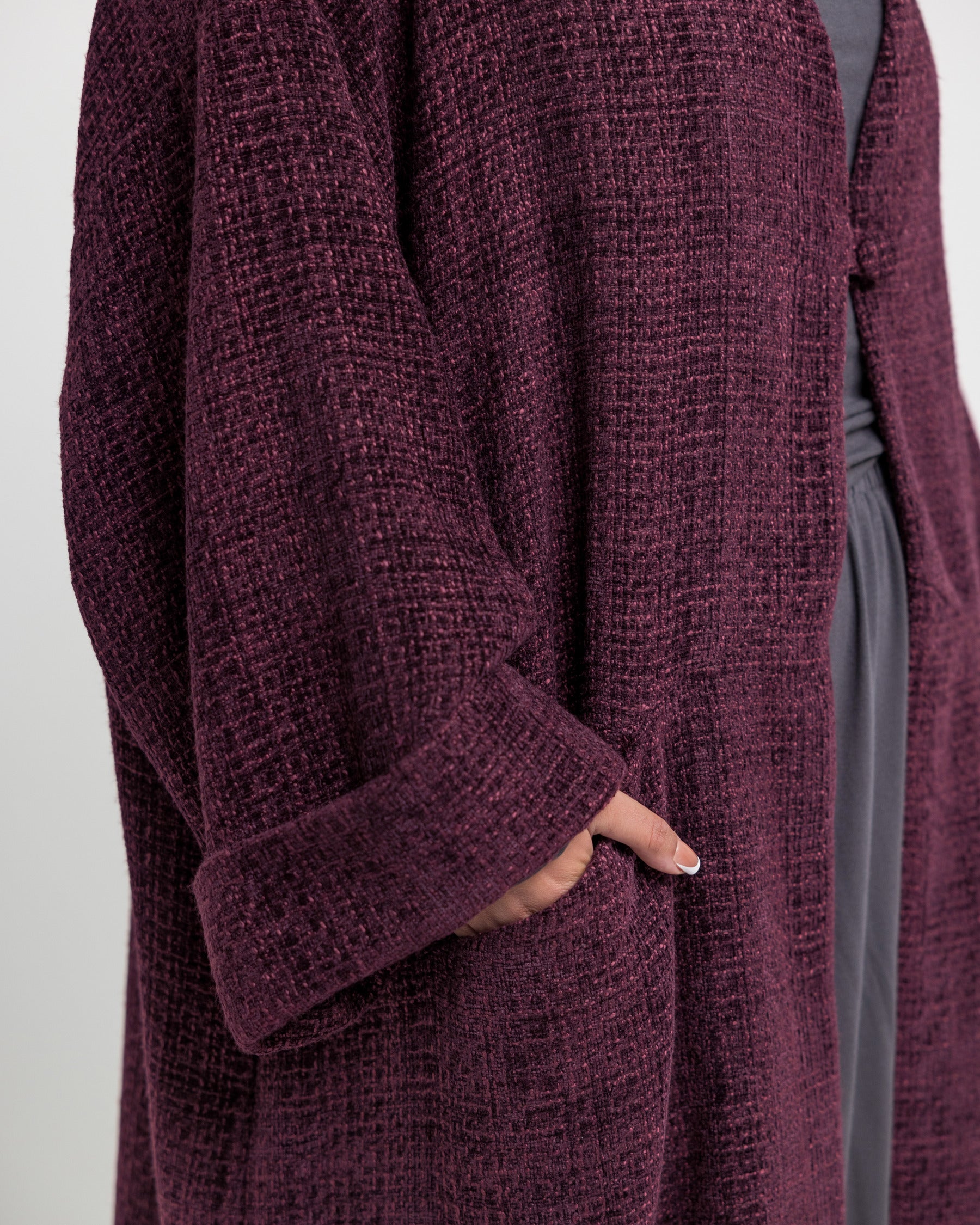 Structured abaya in a woven fabric designed for layering with ease and comfort