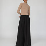 VELA wide-leg palazzo pants with soft drape and modest full-length fit.