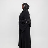 Abaya with crystal accents and wide sleeves designed for graceful movement