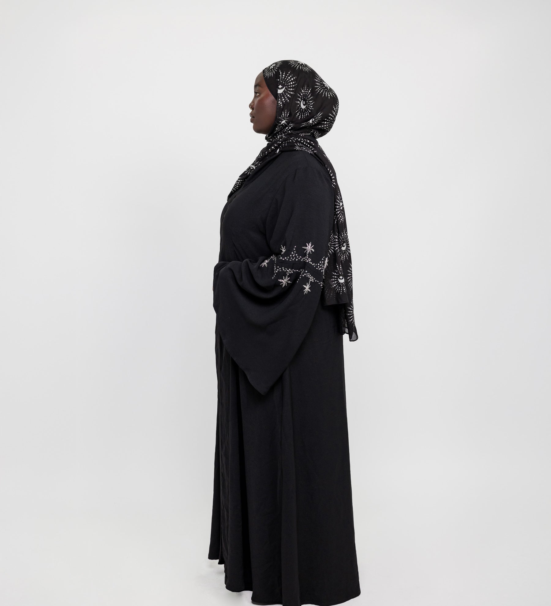 Abaya with crystal accents and wide sleeves designed for graceful movement