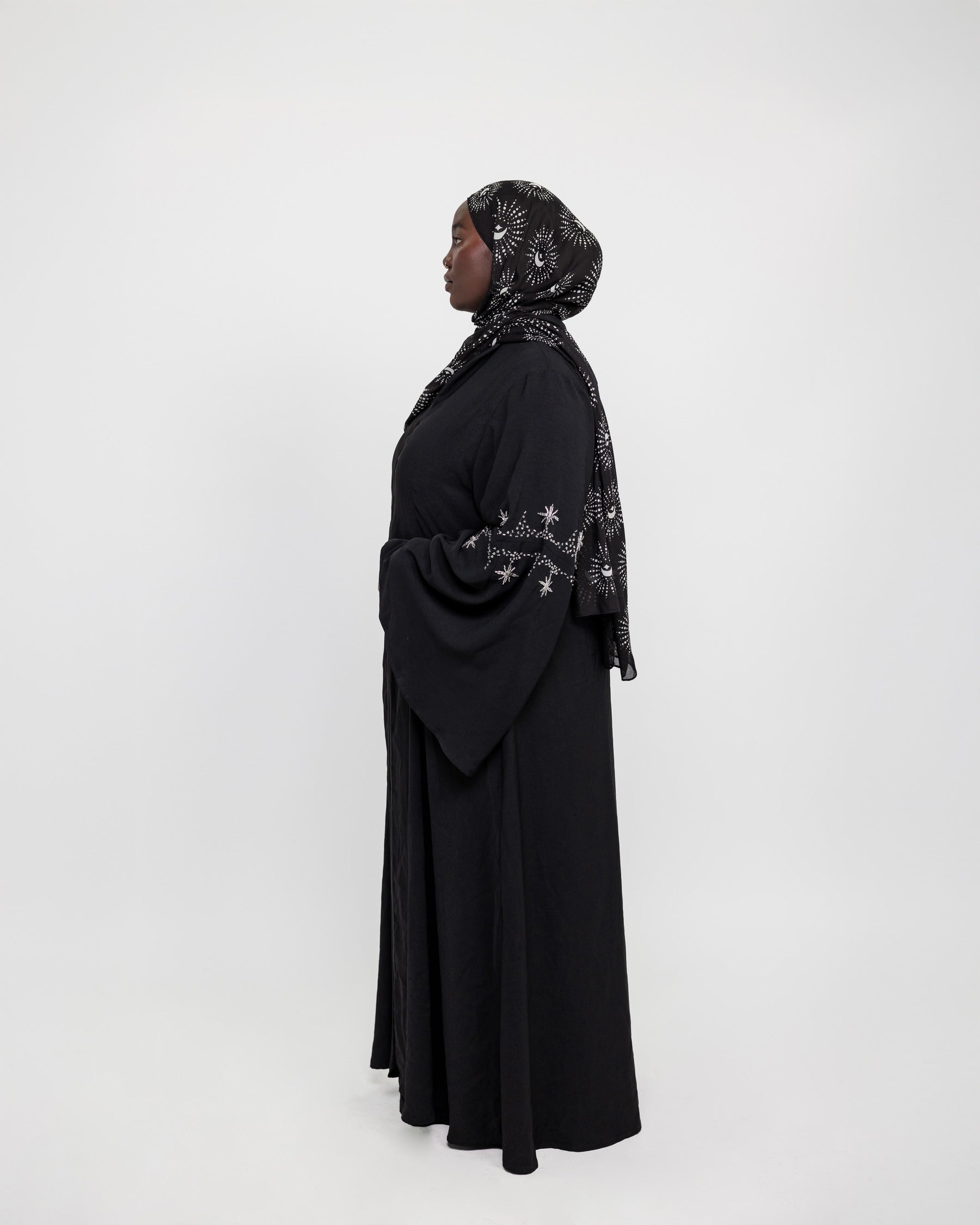 Abaya with crystal accents and wide sleeves designed for graceful movement