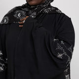 Flared sleeve abaya adorned with shimmering embellishments for a refined finish