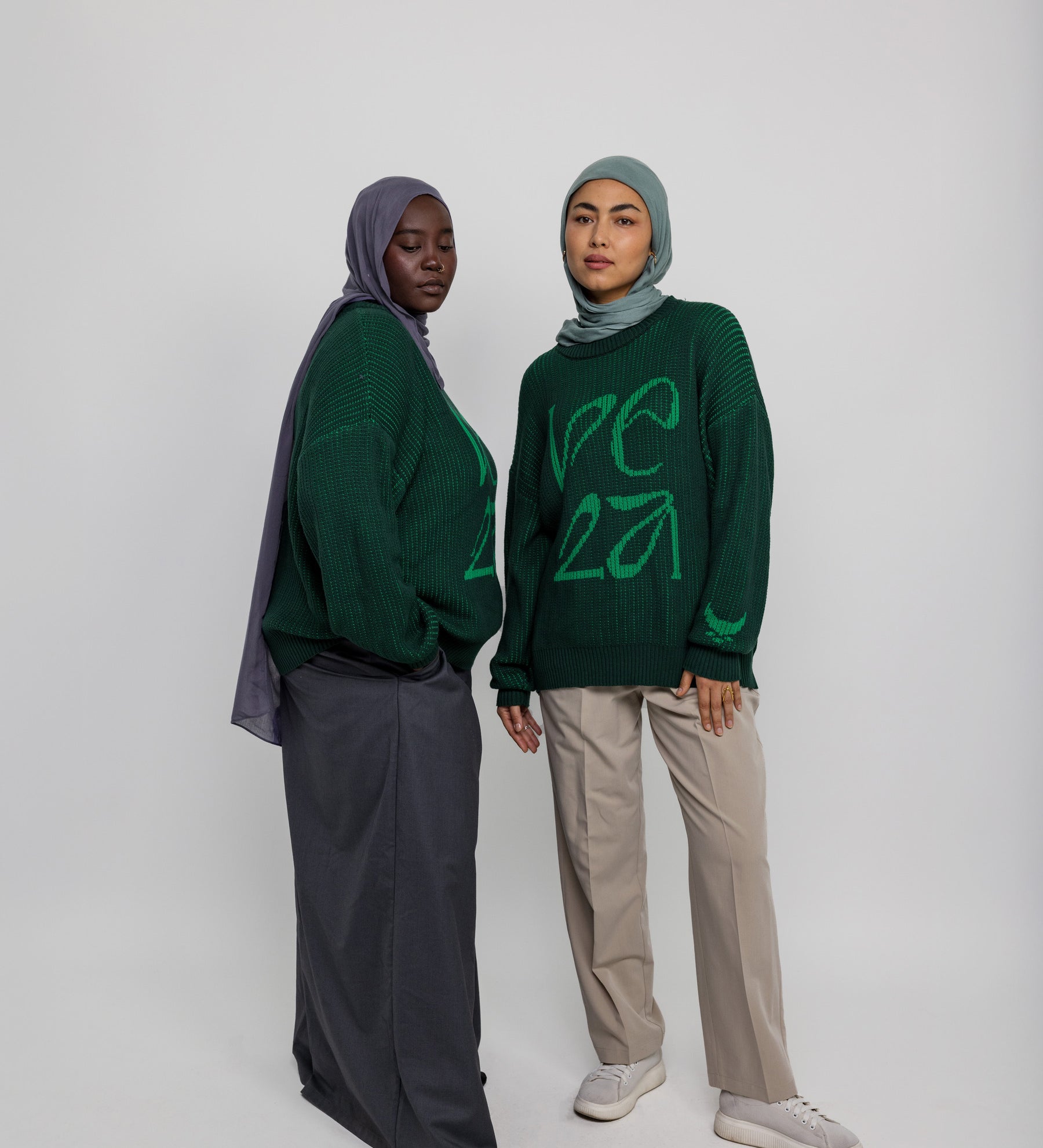 Soft oversized sweater with traditional pattern influence and modern comfort.