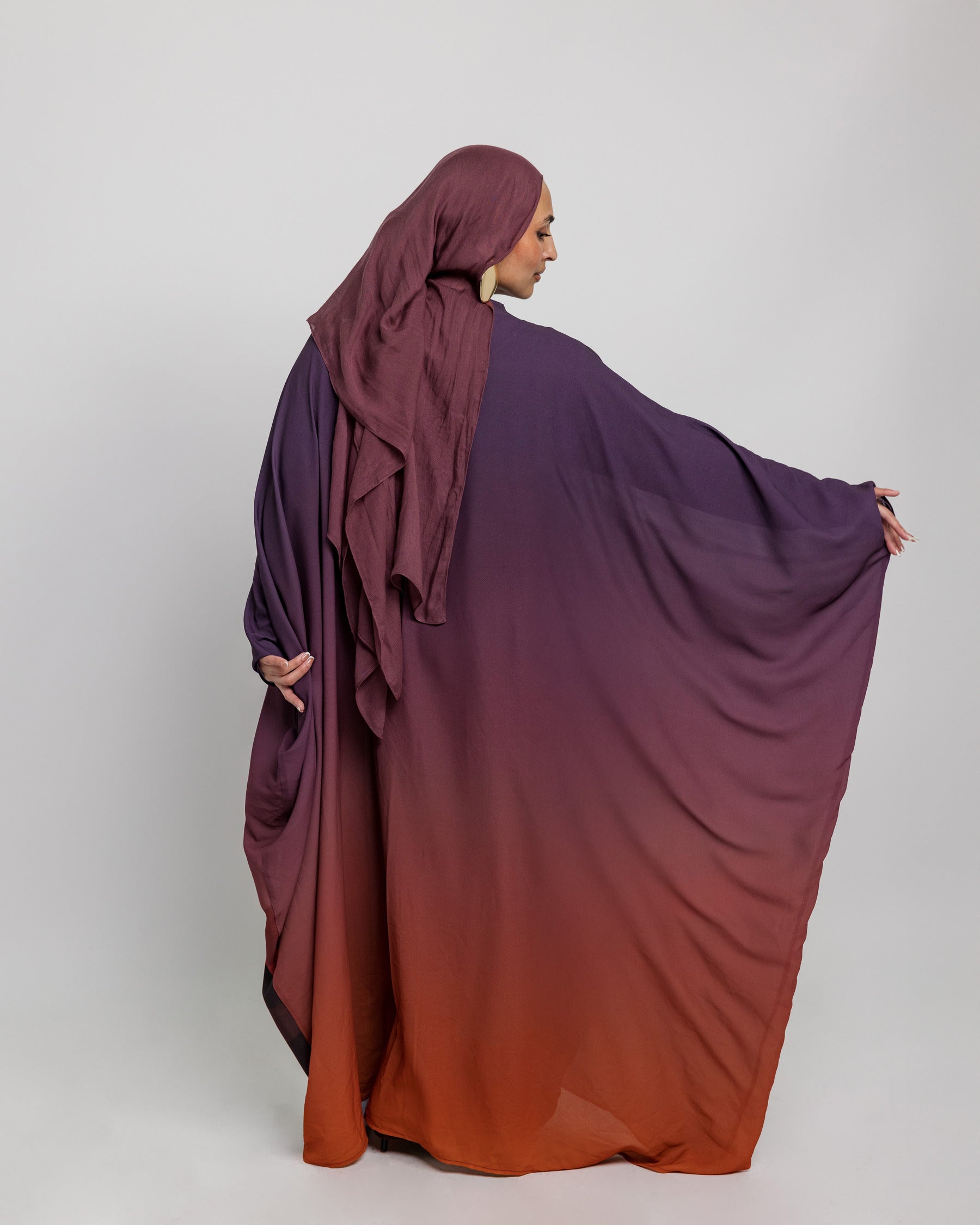 Modest sheer kaftan abaya adorned with symbolic moon phases and light draping