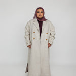 Modest coat-style abaya blending structured design with everyday ease