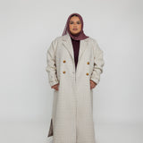 Modest coat-style abaya blending structured design with everyday ease