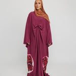 Flowing kaftan designed for special evenings, rooted in cultural symbolism and grace