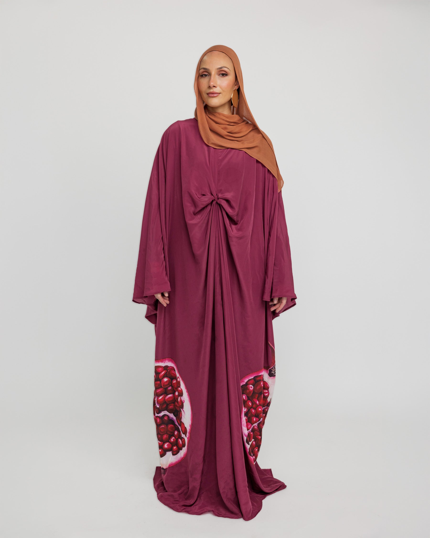 Flowing kaftan designed for special evenings, rooted in cultural symbolism and grace