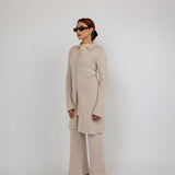 Longline checkered knit cardigan with a tailored fit and soft, breathable fabric.