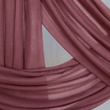 Burnt Clay hijab close up of color and fabric against backdrop.