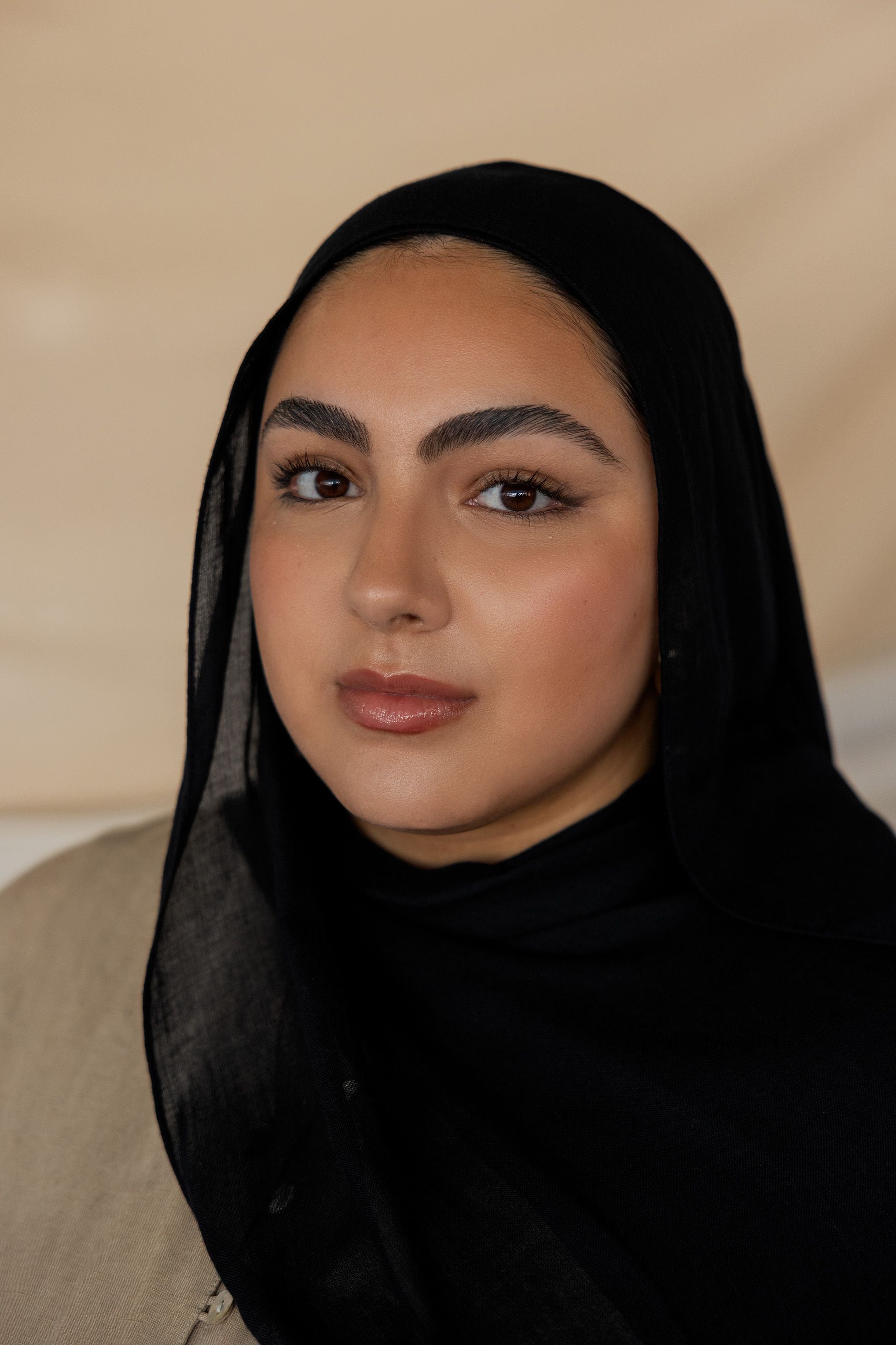 Black modal hijab by VELA, crafted for elegance, breathability, and a polished look