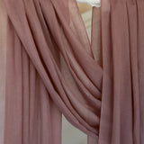 Blush hijab close up of product draped against backdrop.