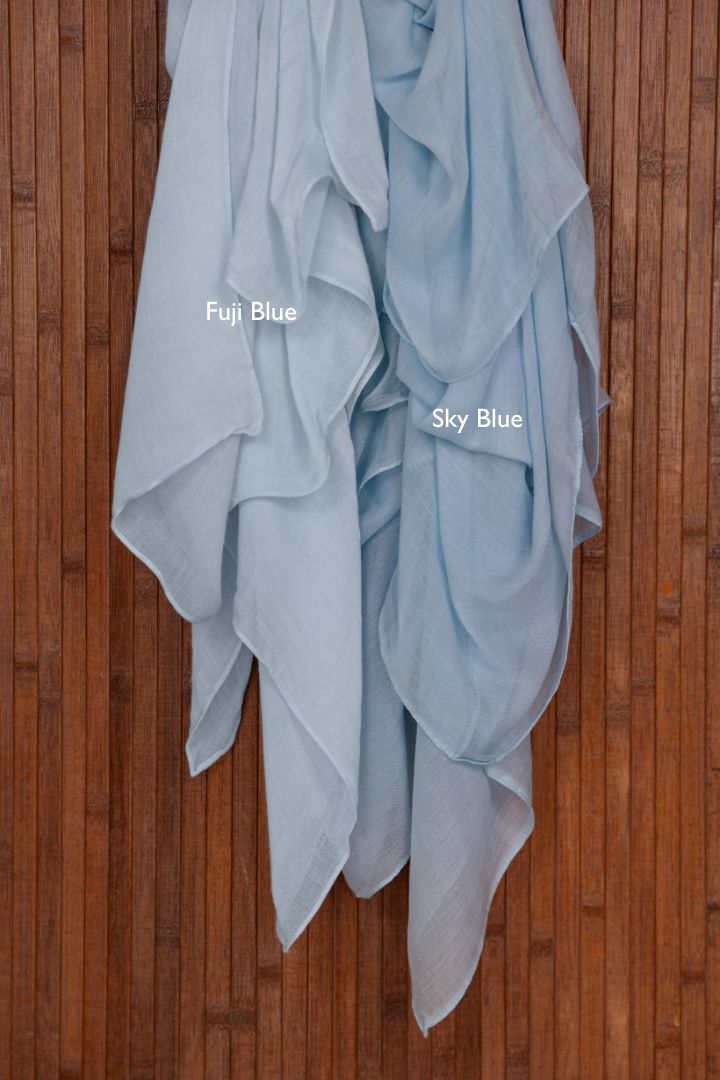 VELA hijabs in a calm blue tone with lightweight modal fabric.