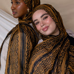 Two Models wearing woven hijab featuring a heritage-inspired print in a modern, watercolor finish.