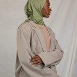 Model wearing Palm Desert Ruching showcasing its versatile styling ability.
