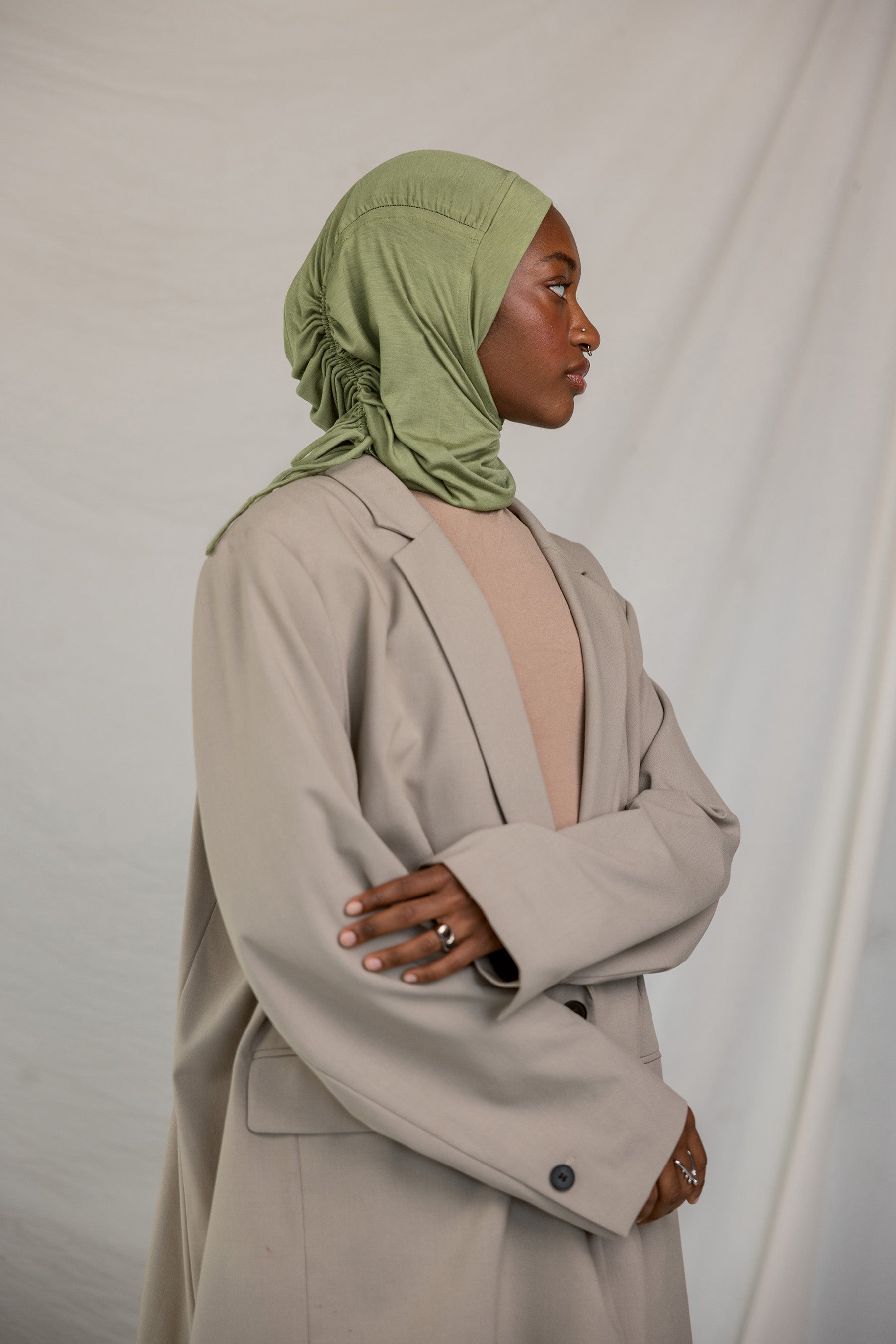 Model wearing Palm Desert Ruching showcasing its versatile styling ability.
