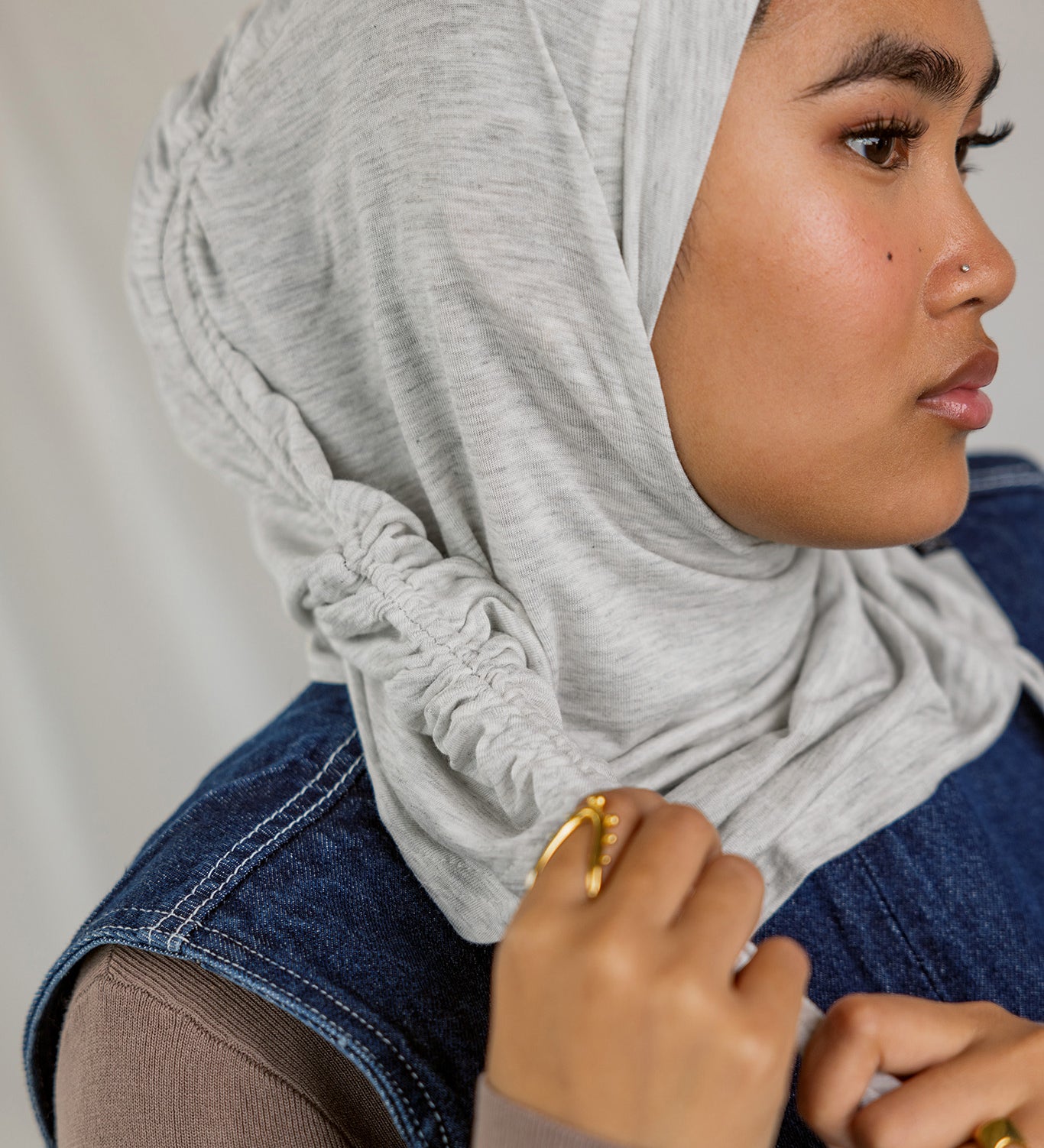 Model wearing Marble Grey Ruching Lite, showing soft ruching and wrinkle-free drape.