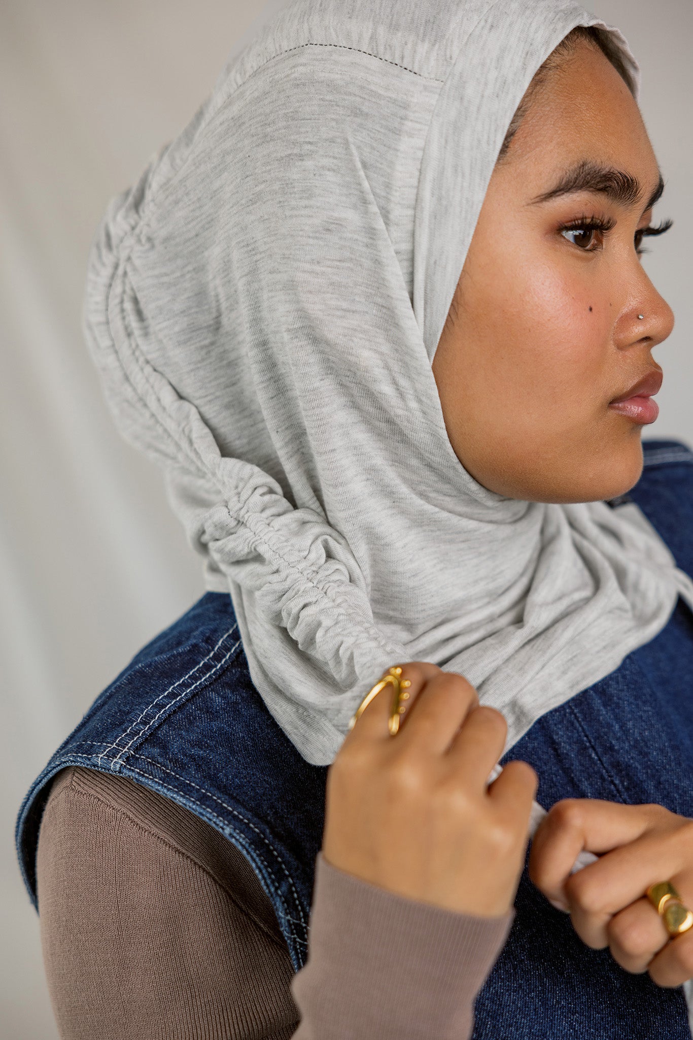 Model wearing Marble Grey Ruching Lite, showing soft ruching and wrinkle-free drape.
