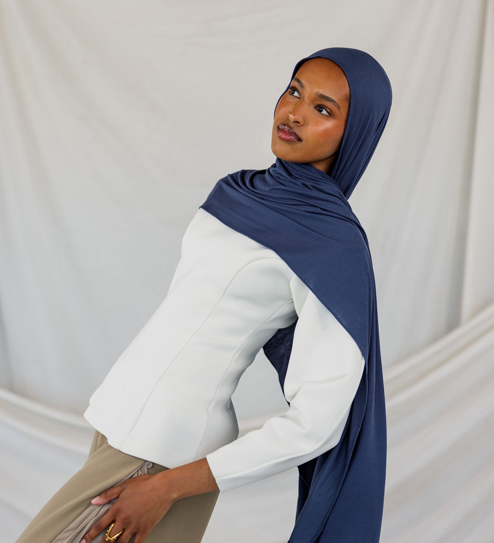 Model wearing Twilight Blue Jersey Lite styled neatly, showing lightweight and wrinkle-free drape.