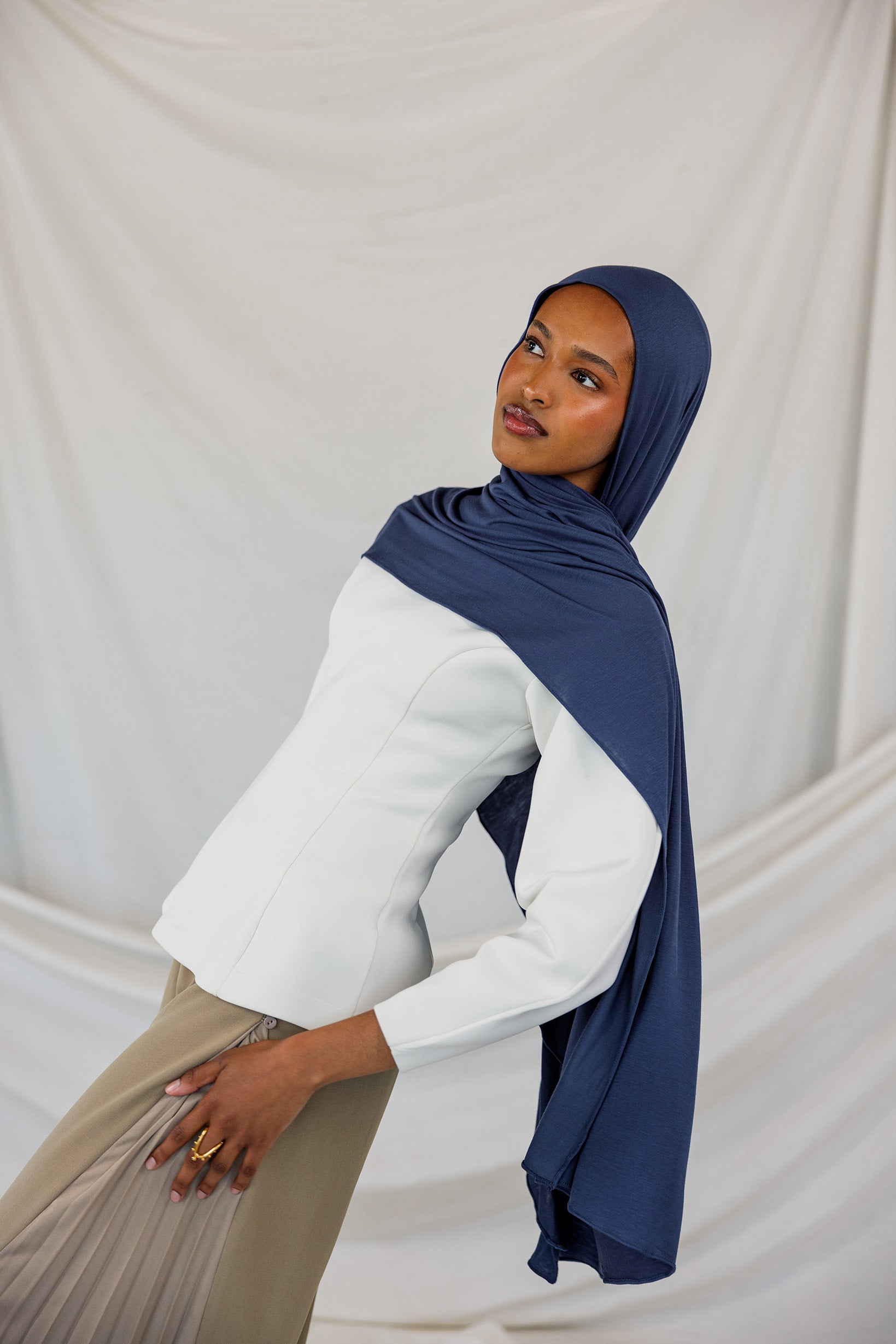 Model wearing Twilight Blue Jersey Lite styled neatly, showing lightweight and wrinkle-free drape.