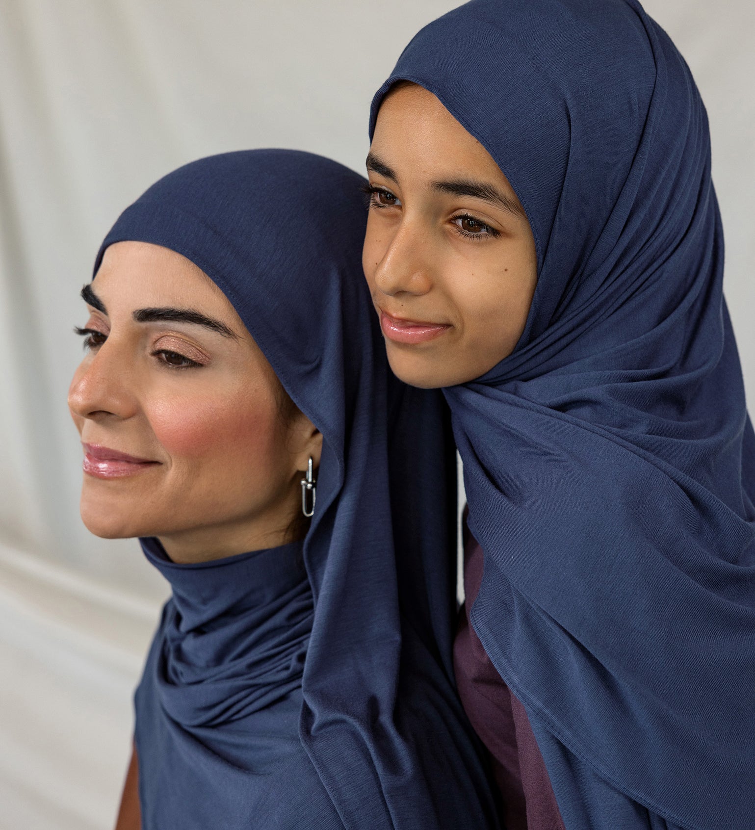 Mother and daughter models wearing Twilight Blue Jersey Lite, highlighting its washed blue tone under different lighting.