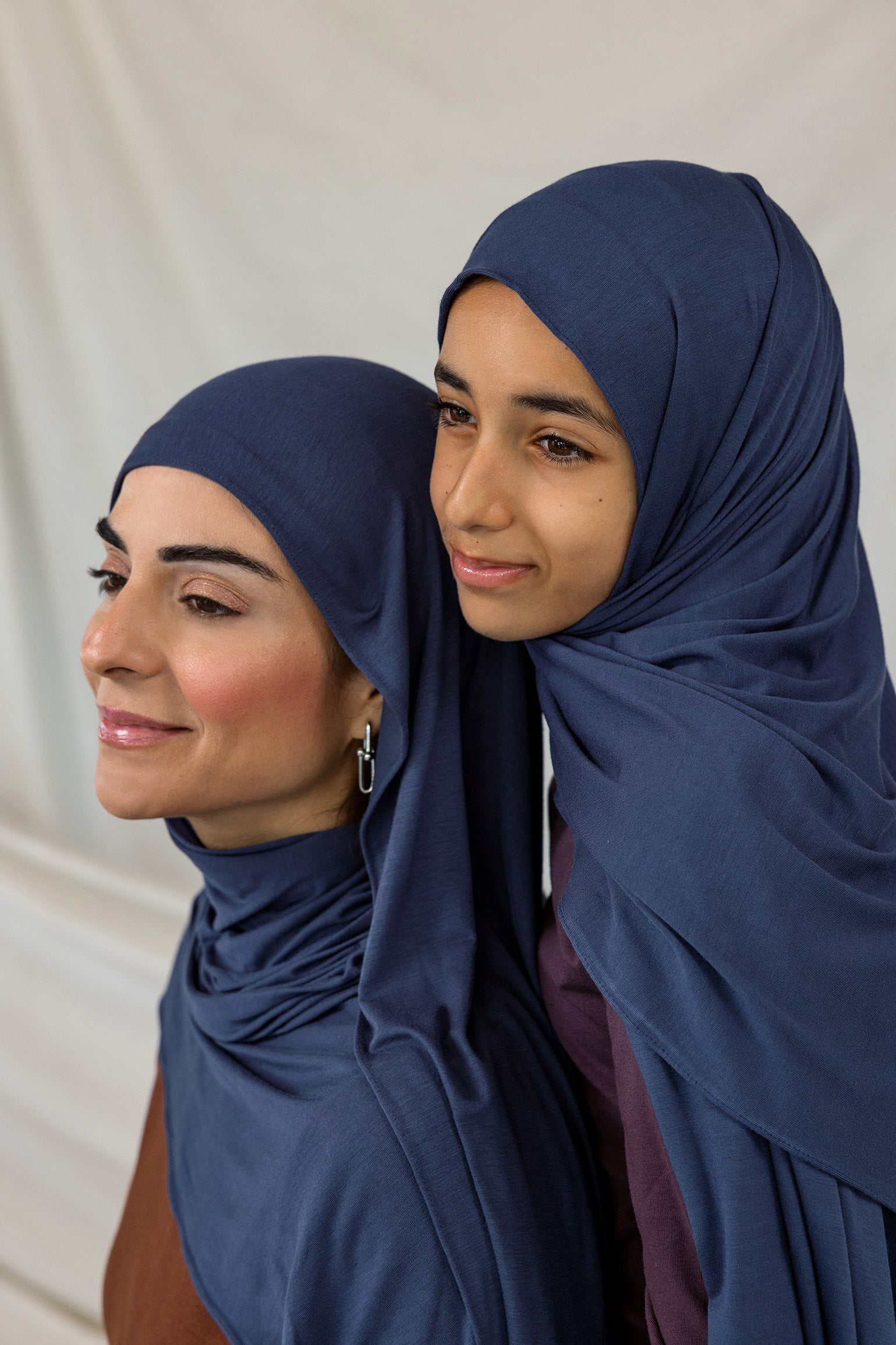 Mother and daughter models wearing Twilight Blue Jersey Lite, highlighting its washed blue tone under different lighting.