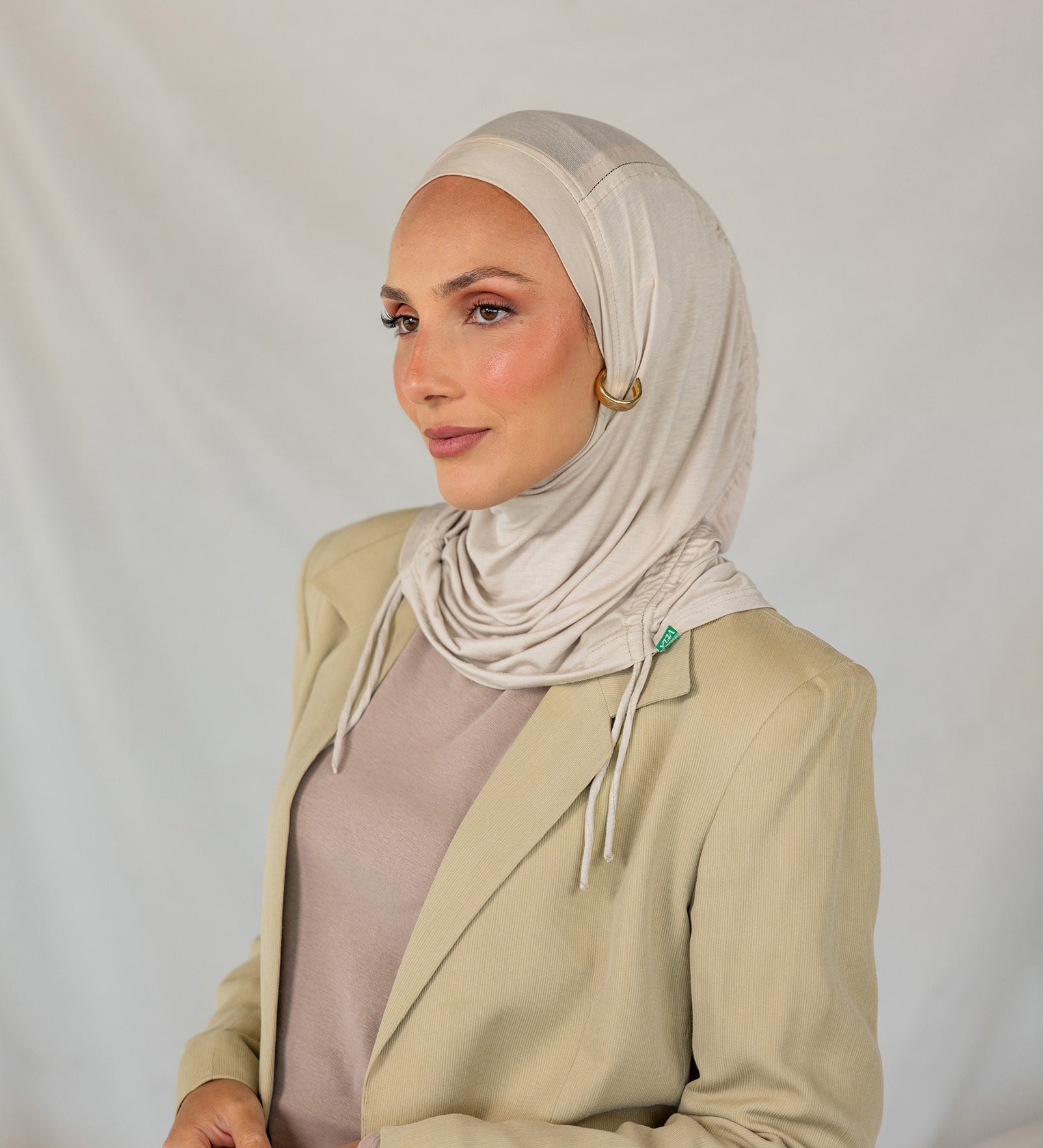 Model wearing Ashwood Ruching Lite with clean ruching, showing breathable and wrinkle-free finish.