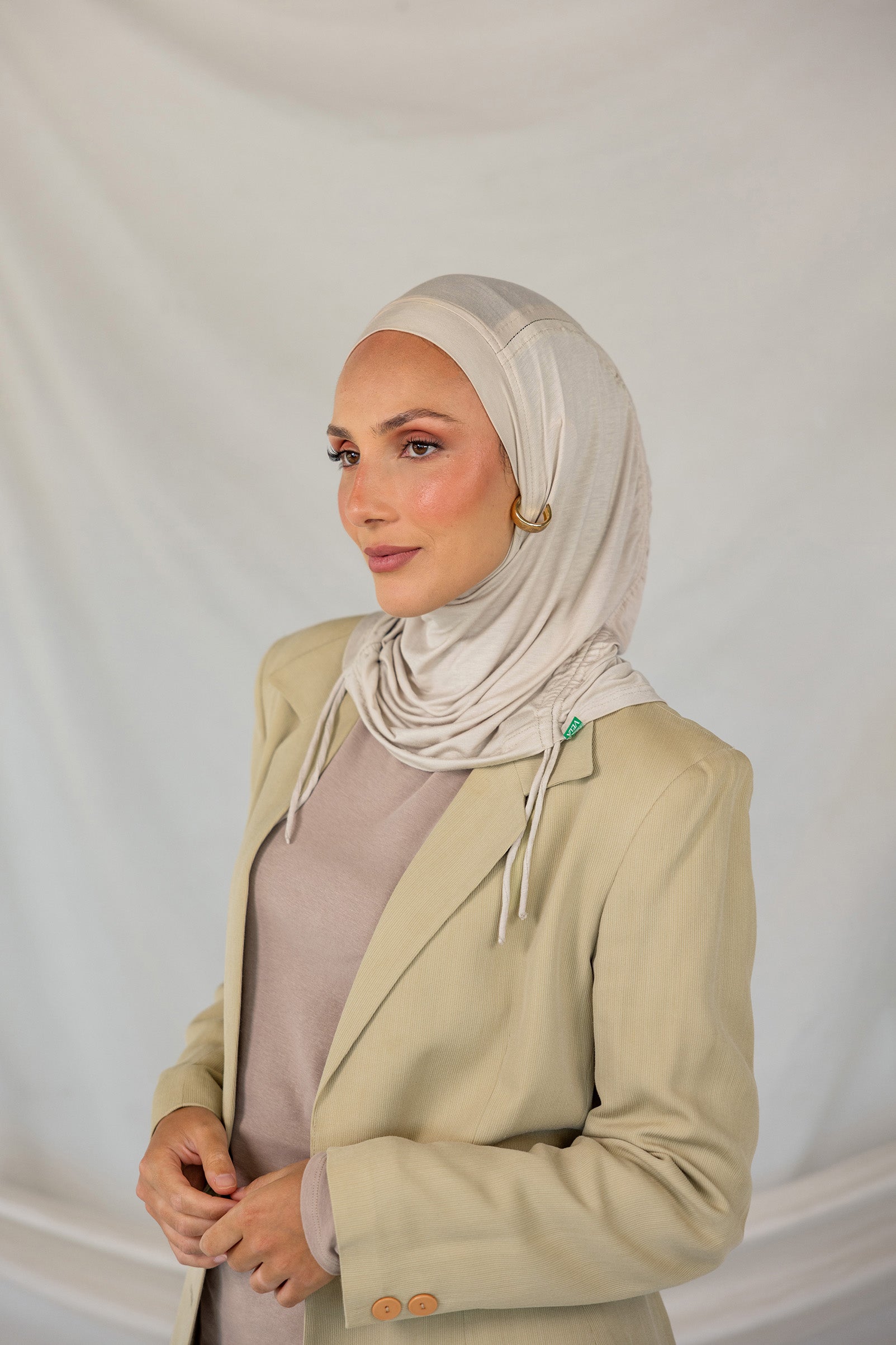 Model wearing Ashwood Ruching Lite with clean ruching, showing breathable and wrinkle-free finish.