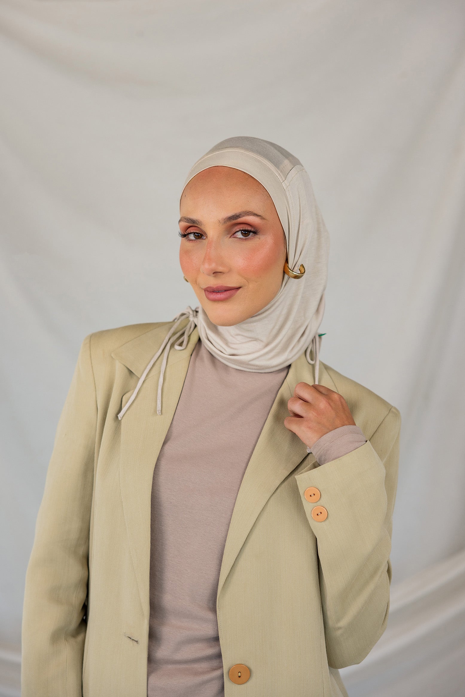 Model wearing Ashwood Ruching Lite with ruching, lightweight material.