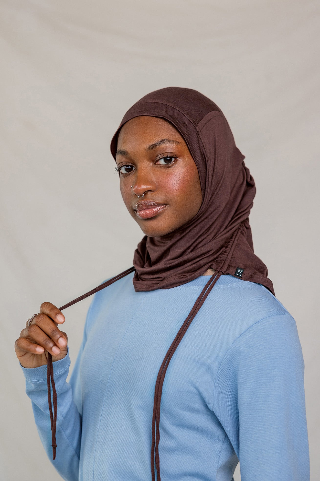 Model wearing Espresso Ruching Lite showcasing front angle perspective.