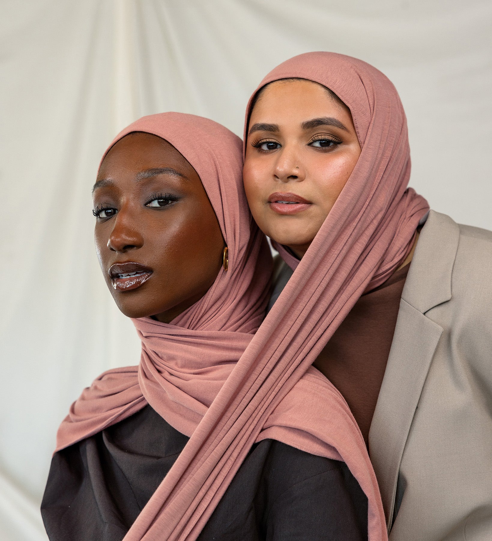 Two models wearing Terra Blush Jersey Lite showing versatility of the warm pink shade.