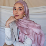 Hijab featuring organic wave patterns inspired by nature’s raw beauty.
