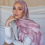 Hijab featuring organic wave patterns inspired by nature’s raw beauty.