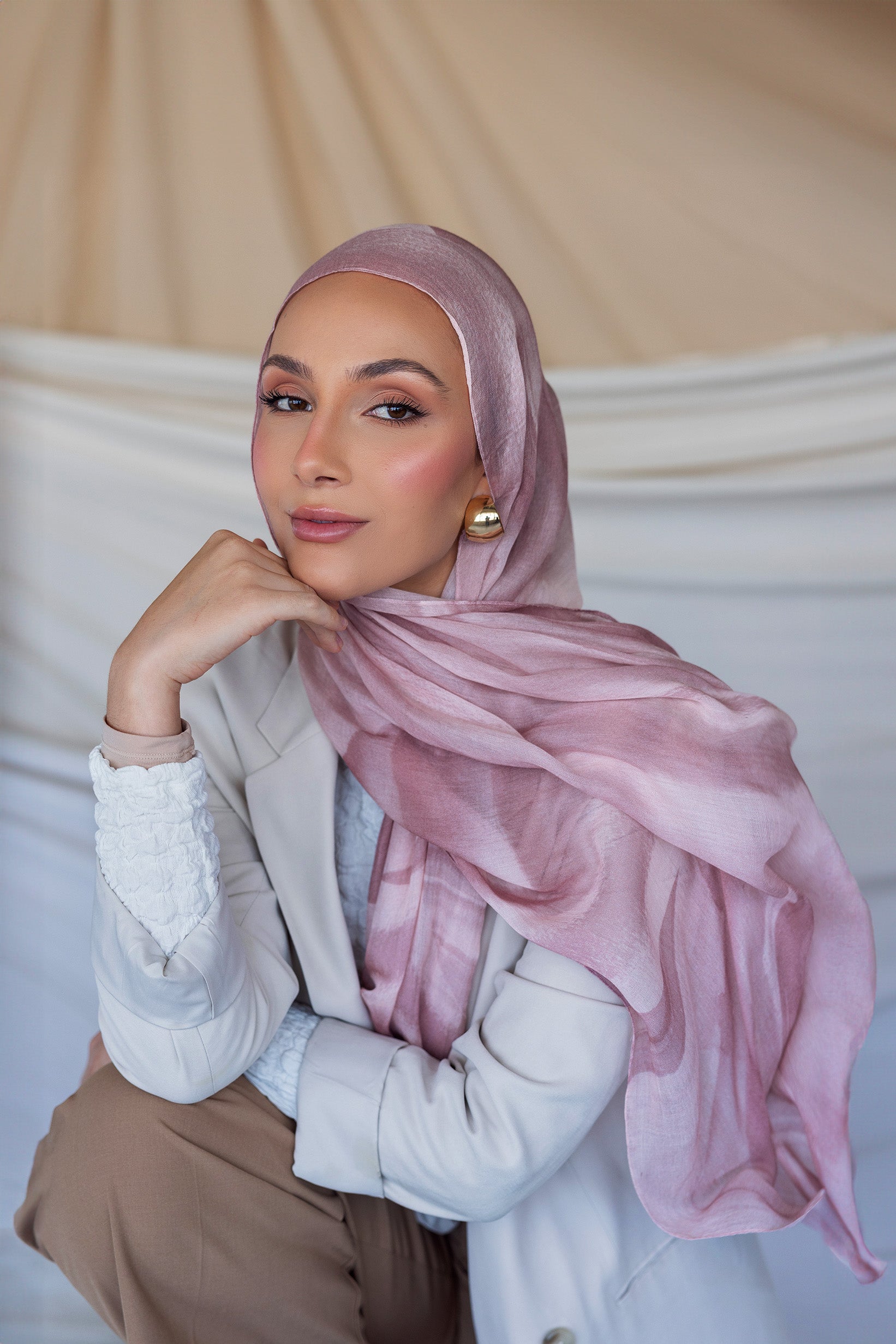 Hijab featuring organic wave patterns inspired by nature’s raw beauty.