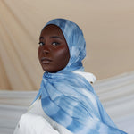 Elevated woven hijab with batch-crafted texture and a smooth, airy feel.