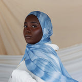 Elevated woven hijab with batch-crafted texture and a smooth, airy feel.