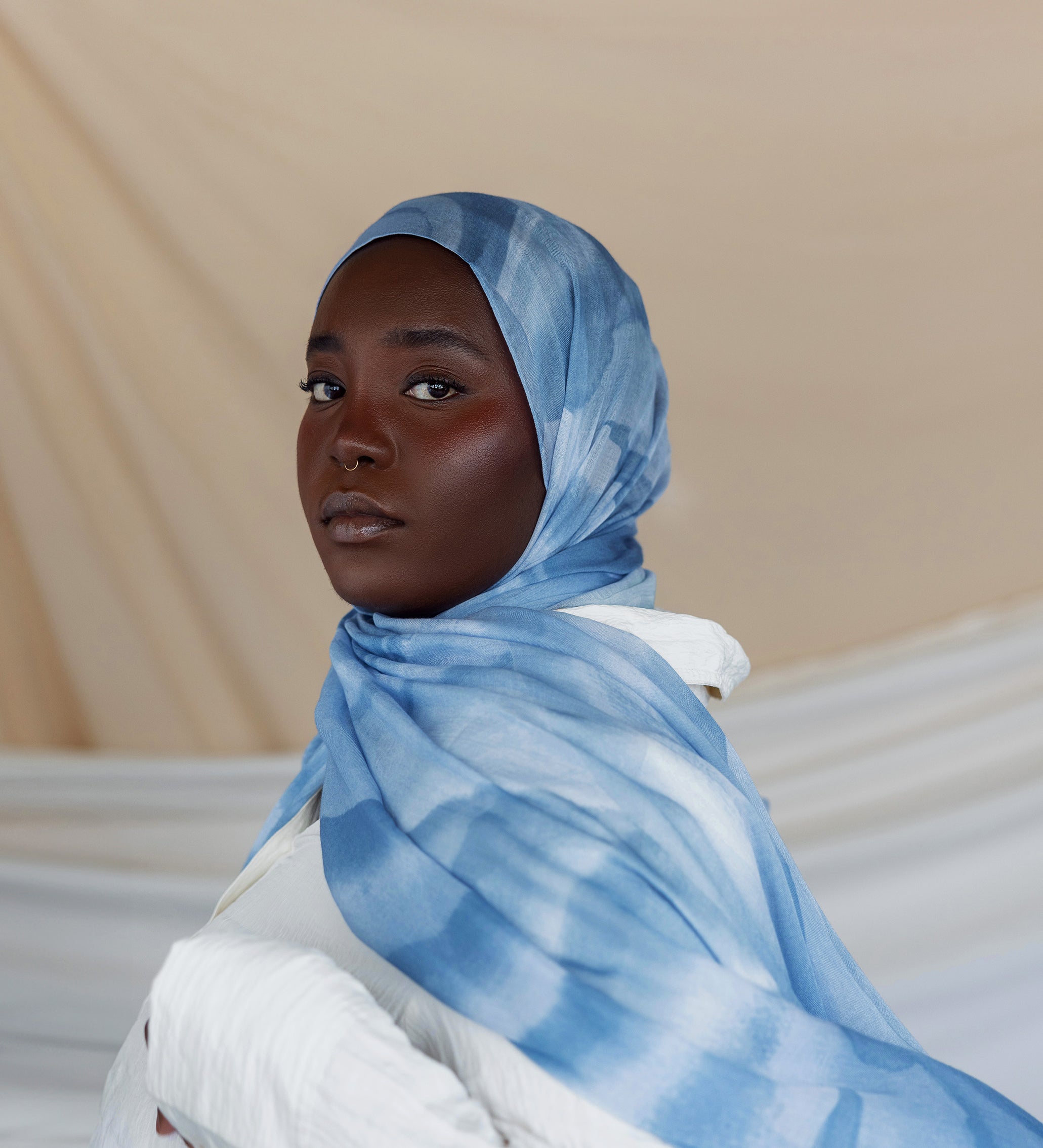 Elevated woven hijab with batch-crafted texture and a smooth, airy feel.