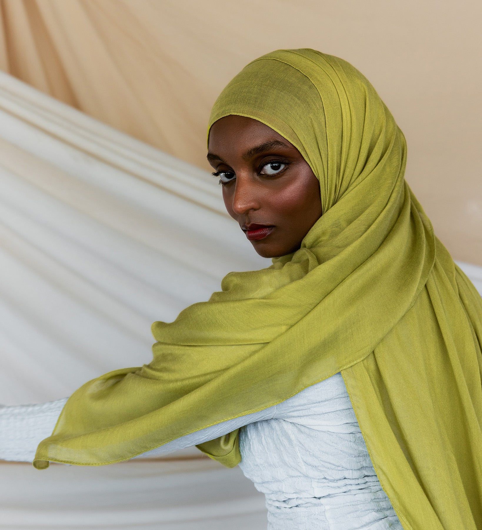 Model wearing lightweight bamboo hijab that adds a bright, refreshing touch to any look.