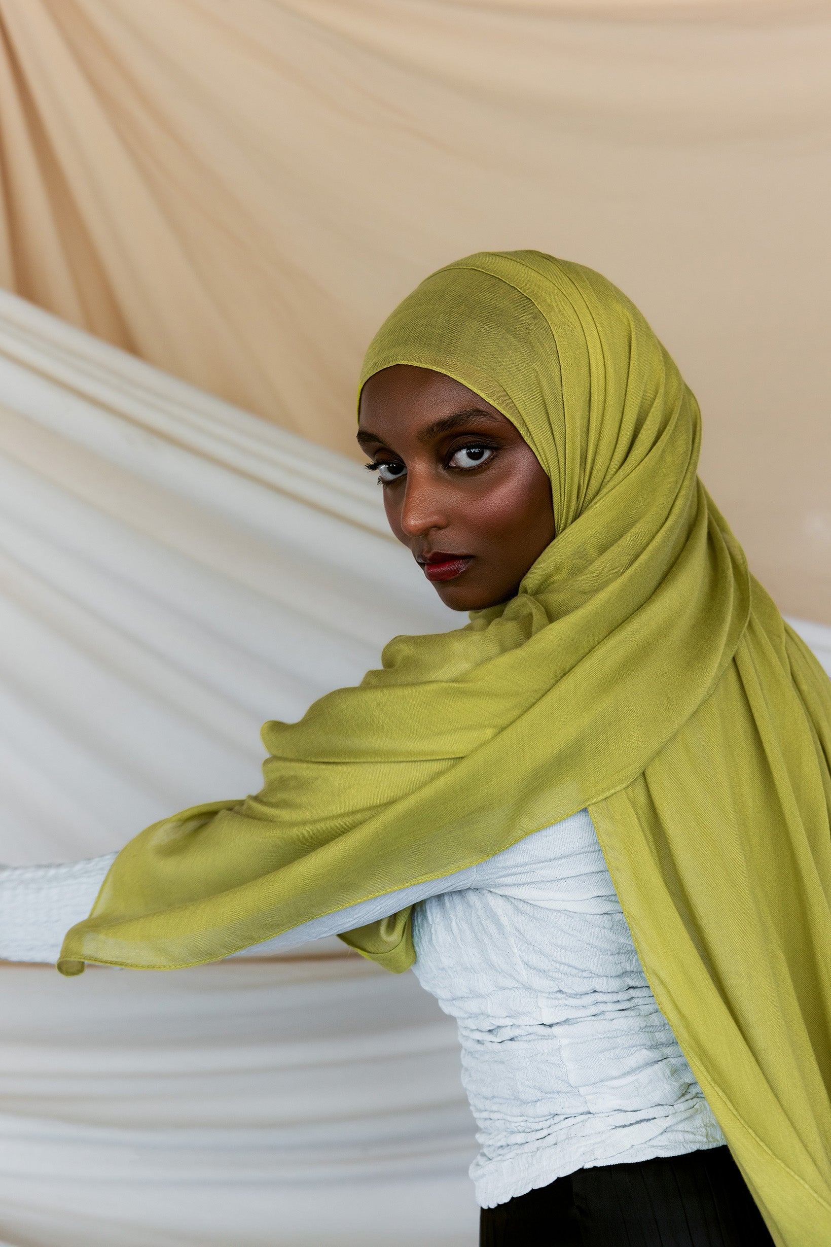 Model wearing lightweight bamboo hijab that adds a bright, refreshing touch to any look.
