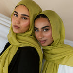 Two Models wearing bamboo hijab with soft texture and vibrant energy, designed for daily wear.