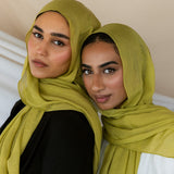 Two Models wearing bamboo hijab with soft texture and vibrant energy, designed for daily wear.