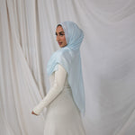 VELA Fuji Blue hijab in soft modal, featuring a pale, tranquil shade inspired by spring skies