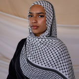 Modal hijab featuring the classic kuffiyeh pattern, designed for meaningful everyday wear.