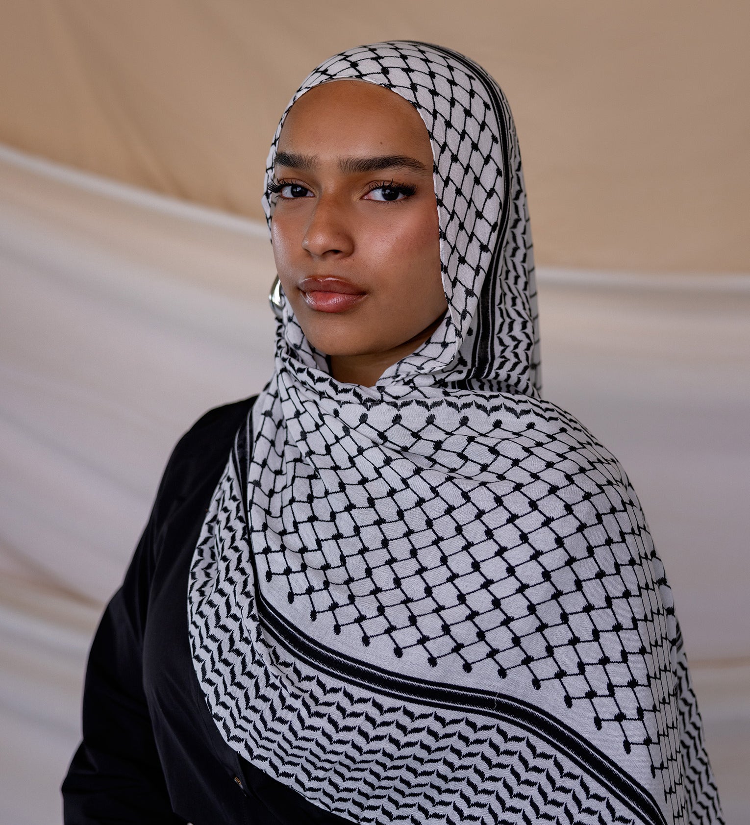 Modal hijab featuring the classic kuffiyeh pattern, designed for meaningful everyday wear.