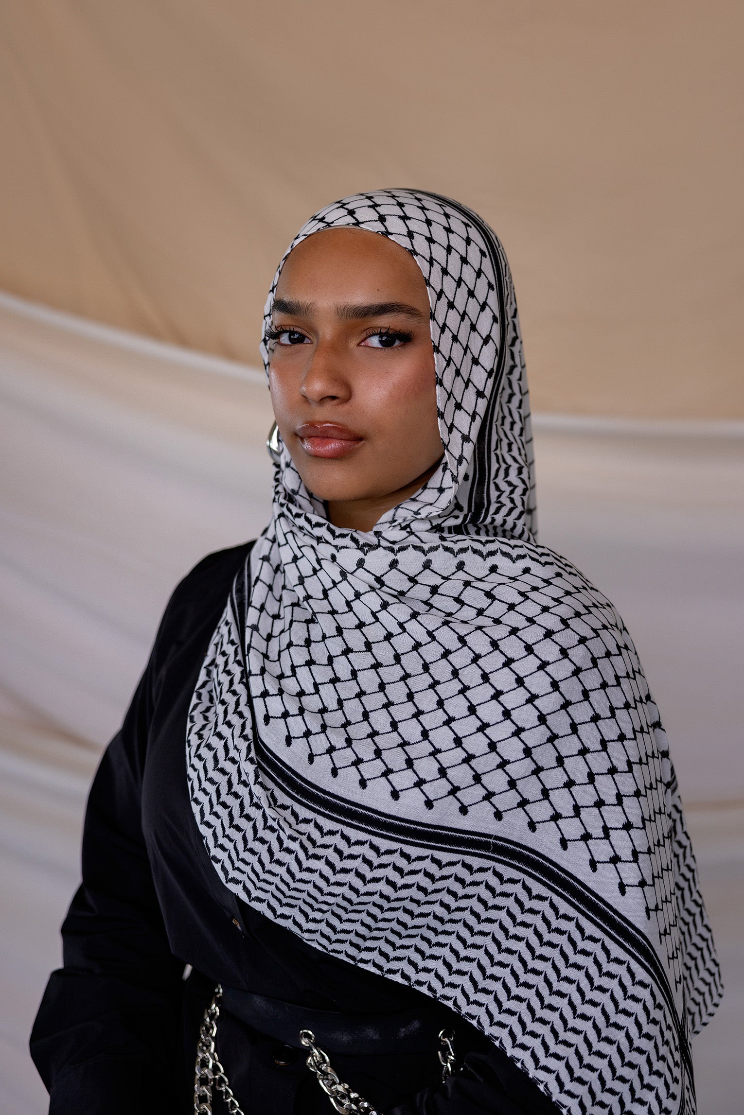 Modal hijab featuring the classic kuffiyeh pattern, designed for meaningful everyday wear.