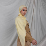 VELA hijab in Yuzu Pie, a citrus-inspired yellow that brings brightness and joy to every look.