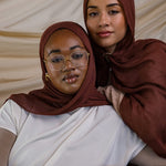 Two Models wearing breathable modal hijab inspired by natural spice tones and crafted in small batches.